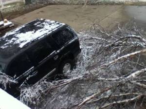 Nicole had originally parked my Yukon right where that tree fell. Fortunately, she came back out and moved it over a bit. Not a scratch!